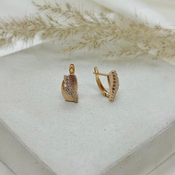 Arete dorado cristal