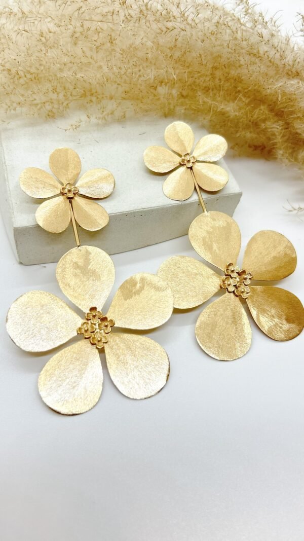 Arete flor doble plata baño 18k