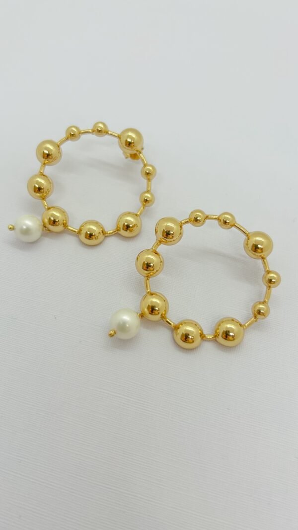 Arete dorado perla
